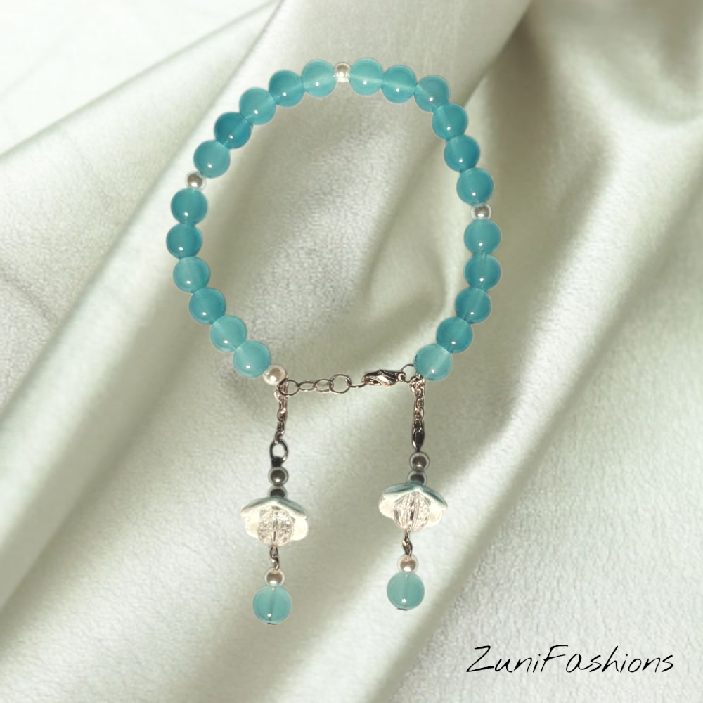 Elegant Beaded Bracelet with Delicate Handmade Floral Charm Accents